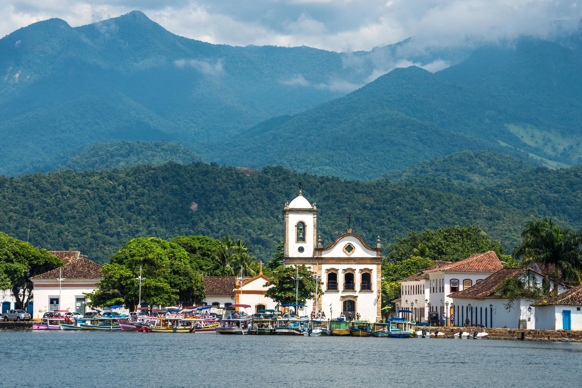 The town of Paraty and green mountains in the background. Photo: Getty